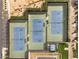 Overhead shot of community tennis courts displaying well-kept courts and green landscaping at 175 E Santa Lucia Ln, Queen Creek, AZ 85140