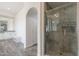 Modern bathroom showcasing a glass-enclosed shower, neutral color palette, and ample counter space at 18438 N 96Th Way, Scottsdale, AZ 85255