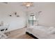 Bright bedroom with a sliding glass door leading to a patio and mountain views at 18438 N 96Th Way, Scottsdale, AZ 85255