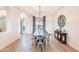 Dining room features a rustic table with seating for six and stylish accents at 18438 N 96Th Way, Scottsdale, AZ 85255