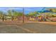 Community playground featuring a unique climbing structure and play equipment for children of all ages at 18438 N 96Th Way, Scottsdale, AZ 85255