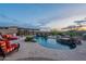 Beautiful pool with water feature, spa, and luxurious lounge seating for ultimate relaxation at 18438 N 96Th Way, Scottsdale, AZ 85255