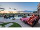 Relaxing pool area featuring a waterfall, spa, and lounge chairs, perfect for outdoor enjoyment at 18438 N 96Th Way, Scottsdale, AZ 85255