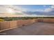 Spacious rooftop deck offers panoramic views of the surrounding desert landscape and stunning sunsets at 18438 N 96Th Way, Scottsdale, AZ 85255