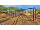 Fun playground with a long row of swings and covered play equipment for hours of outdoor fun at 18438 N 96Th Way, Scottsdale, AZ 85255