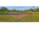 Sand volleyball court perfect for friendly games and outdoor recreation in the community at 18438 N 96Th Way, Scottsdale, AZ 85255