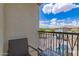 Outdoor balcony with wrought iron railing and views of the nearby neighborhood at 1851 E Frye Rd # 101, Gilbert, AZ 85295