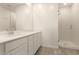Bathroom features a subway tile shower with a glass door and white vanity at 1851 E Frye Rd # 101, Gilbert, AZ 85295