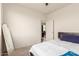 Bedroom featuring a full-length mirror and view through to the hallway at 1851 E Frye Rd # 101, Gilbert, AZ 85295