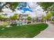 Beautiful lake within the community, featuring walking trails and picturesque views at 1851 E Frye Rd # 101, Gilbert, AZ 85295