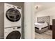 Convenient stackable washer and dryer in the laundry area near the bedroom at 1851 E Frye Rd # 101, Gilbert, AZ 85295
