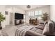 Spacious living room with comfortable seating, media center, and bright natural light at 1851 E Frye Rd # 101, Gilbert, AZ 85295