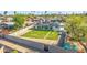 Aerial view of a single-Gathering home with large fenced backyard and mature trees at 1868 E La Donna Dr, Tempe, AZ 85283