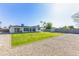 Large backyard with gravel, lawn, and stone pavers at 1868 E La Donna Dr, Tempe, AZ 85283