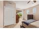 Serene bedroom featuring a sliding glass door to the balcony and generous natural light at 1945 W Desert Vista Trl # 77, Phoenix, AZ 85085