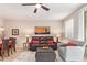 Inviting living room featuring comfortable seating, a ceiling fan, and stylish decor, perfect for relaxation at 1945 W Desert Vista Trl # 77, Phoenix, AZ 85085