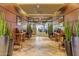 The lobby boasts stylish chairs and decorative tables with plant accents along a geometric-tiled floor at 1945 W Desert Vista Trl # 77, Phoenix, AZ 85085