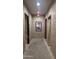 Locker room entrance with tile walls, artwork, and steam coming from an open sauna at 1945 W Desert Vista Trl # 77, Phoenix, AZ 85085