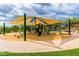 Covered playground with swings, slides, and climbing structures for hours of fun at 1945 W Desert Vista Trl # 77, Phoenix, AZ 85085