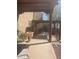 Back Patio features brickwork, wooden beams, and beautiful desert plants at 20042 W Colter St, Litchfield Park, AZ 85340