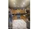 Spacious kitchen with stainless steel appliances and ample cabinet space at 20042 W Colter St, Litchfield Park, AZ 85340