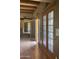Light-filled living room with hardwood floors and access to outdoor patio at 20042 W Colter St, Litchfield Park, AZ 85340
