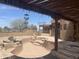 Spacious backyard with an unfinished pool, rock features and patio perfect for creating a relaxing outdoor space at 20042 W Colter St, Litchfield Park, AZ 85340