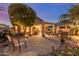 Beautiful backyard with a covered patio, perfect for evening relaxation and entertainment at 20555 N 261St Ave, Buckeye, AZ 85396