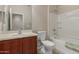 Well-maintained bathroom features a combination shower and tub, vanity, and neutral decor at 20555 N 261St Ave, Buckeye, AZ 85396