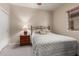 Cozy bedroom with a queen-sized bed, window, and closet space, perfect for relaxation at 20555 N 261St Ave, Buckeye, AZ 85396