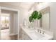 Well-lit bathroom showcasing double sinks, stylish decor, and modern finishes at 20801 N 90Th Pl # 169, Scottsdale, AZ 85255
