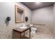 Community bathroom includes accessible features and neutral tones at 20801 N 90Th Pl # 169, Scottsdale, AZ 85255