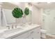 Elegant bathroom featuring double sinks, modern fixtures, and bright lighting at 20801 N 90Th Pl # 169, Scottsdale, AZ 85255