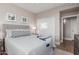 Comfortable bedroom with a plush bed, neutral tones, and natural light at 20801 N 90Th Pl # 169, Scottsdale, AZ 85255