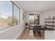 Bright dining space featuring a modern chandelier, outdoor views, and access to the patio at 20801 N 90Th Pl # 169, Scottsdale, AZ 85255