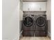 Modern washer and dryer set in the updated laundry room at 20801 N 90Th Pl # 169, Scottsdale, AZ 85255