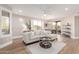 Spacious living room with a comfortable sofa, modern decor, and abundant natural light at 20801 N 90Th Pl # 169, Scottsdale, AZ 85255