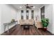 Cozy living room with lots of seating, attractive furniture, hardwood floors, and a ceiling fan at 20801 N 90Th Pl # 169, Scottsdale, AZ 85255