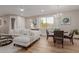 Inviting living room features stylish decor, natural light, and an adjacent dining area at 20801 N 90Th Pl # 169, Scottsdale, AZ 85255