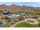 An aerial view shows the clubhouse, pools, parks, and walking trails for outdoor activities at 2118 W Hunter Ct # 136, Phoenix, AZ 85085