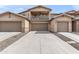 Inviting townhome featuring attached garages and a private balcony perfect for enjoying the outdoors at 2118 W Hunter Ct # 136, Phoenix, AZ 85085