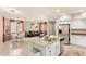 Open-concept kitchen with island featuring granite countertops, stainless steel appliances, and view of dining area at 2118 W Hunter Ct # 136, Phoenix, AZ 85085