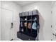 Functional mud room with storage lockers and hooks to keep your home organized and tidy at 21407 W Hubbell St, Buckeye, AZ 85396