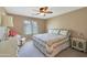 Relaxing bedroom features bright window and ceiling fan at 2181 E 27Th Ave, Apache Junction, AZ 85119