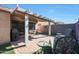 A covered patio offers an excellent space for relaxing or entertaining friends and Gathering outdoors at 2181 E 27Th Ave, Apache Junction, AZ 85119