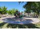 Community playground featuring a colorful play structure, slide and a soft sand base for safety at 2181 E 27Th Ave, Apache Junction, AZ 85119