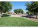 Neighborhood park with a playground and swing set provides a fun and safe environment at 2181 E 27Th Ave, Apache Junction, AZ 85119