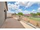 Large covered balcony area with neighborhood views, perfect for relaxing at 2210 W Goldmine Mountain Dr, Queen Creek, AZ 85144