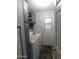 Functional laundry area with washer, dryer, cabinets, and access to the outside at 2400 E Baseline Ave # 153, Apache Junction, AZ 85119