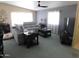 Comfortable living room with plush seating, modern decor, and a ceiling fan at 2400 E Baseline Ave # 153, Apache Junction, AZ 85119